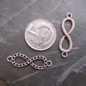 Konektor, mezikus nekonečno 32,5x10mm - starostříbrný - 1 ks