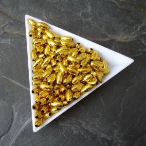 Plastové korálky rýže cca 8x4mm zlaté, mosazné